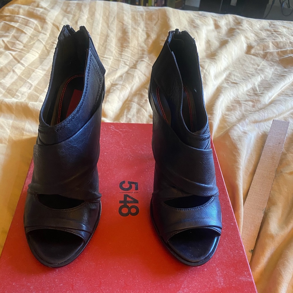 Black crisscross heel open toe booties